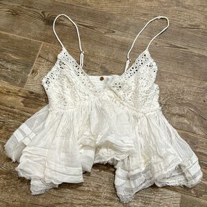 Super cute white free people top. Size small.